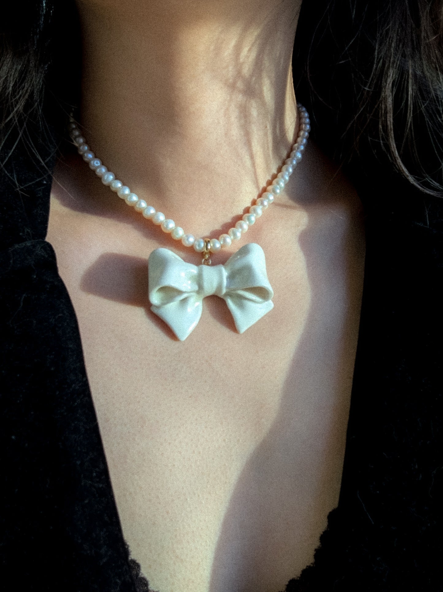 Bowtie Maniac - Large Ceramic Bowtie Charm Round Freshwater Pearl Necklace