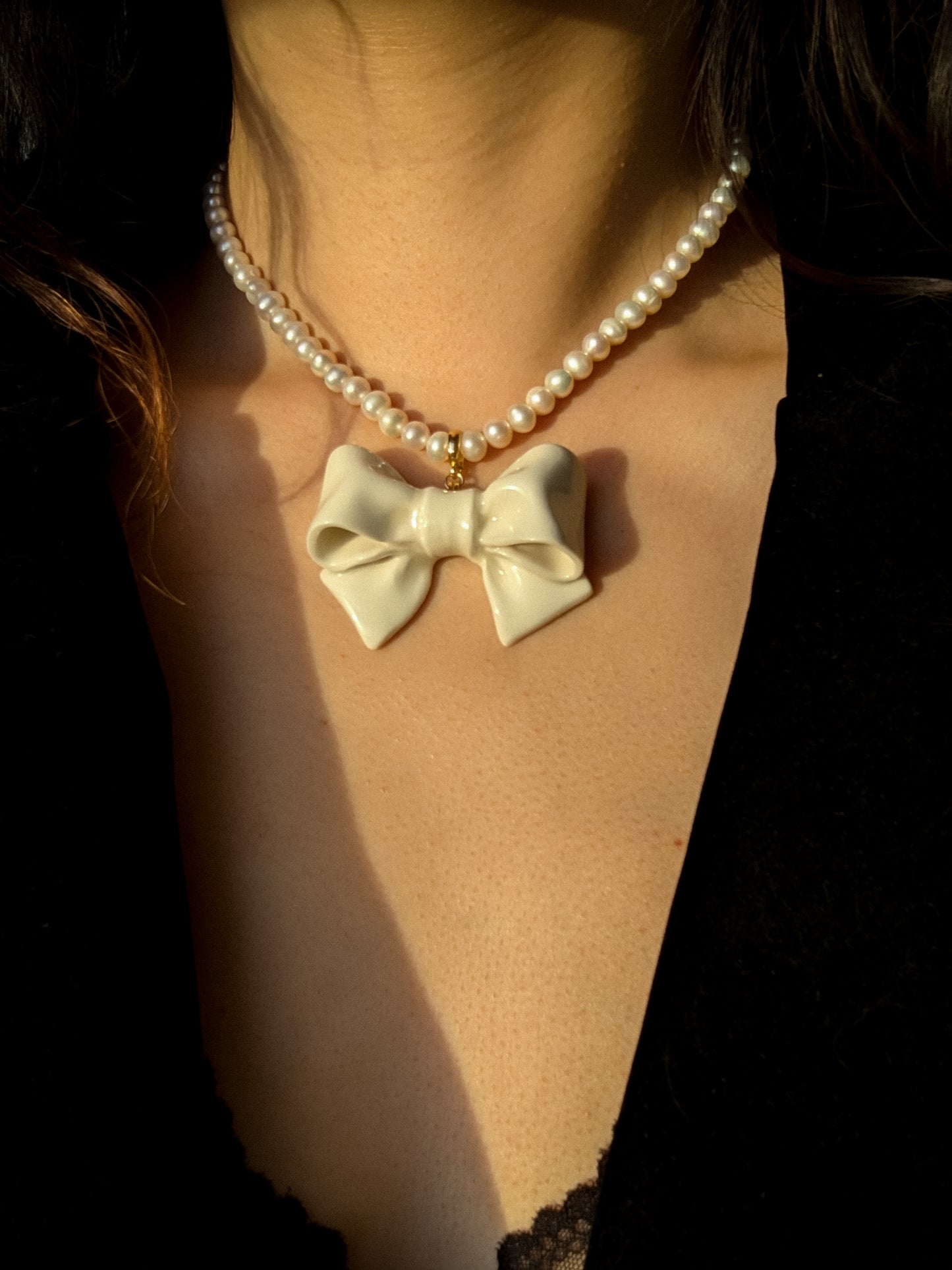 Bowtie Maniac - Large Ceramic Bowtie Charm Round Freshwater Pearl Necklace