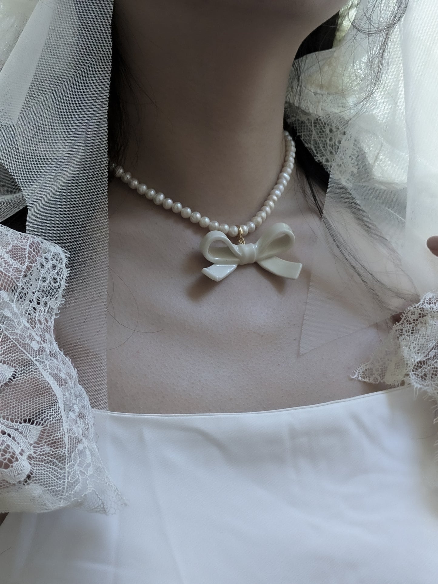 Bowtie Maniac - Medium Ceramic Ribbon Charm Bowtie Freshwater Pearl Necklace White