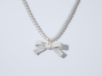 Bowtie Maniac - Medium Ceramic Ribbon Bowtie Round Freshwater Pearl Necklace